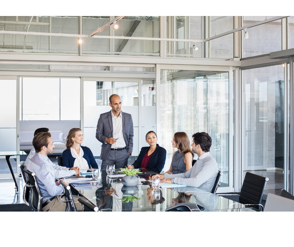 Photos of team around a table