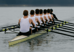 men rowing in sync